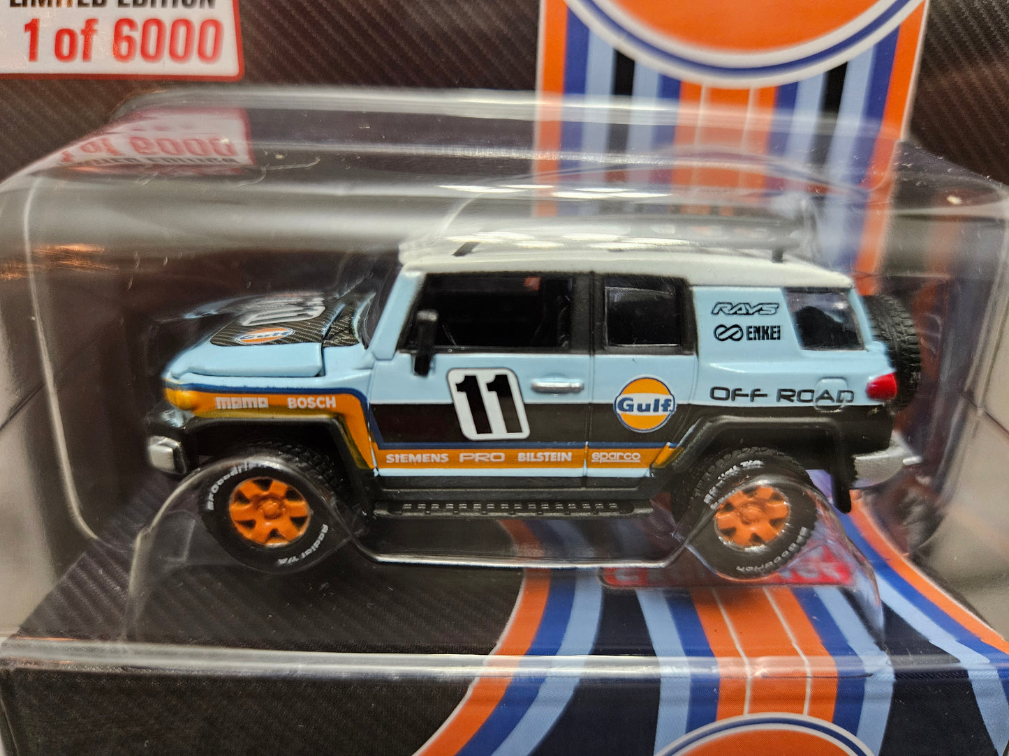 Johnny Lightning 1:64 - 2007 Toyota FJ Cruiser 4×4 Off-Road Gulf Mijo Exclusives